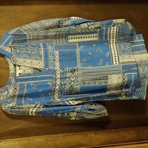 Kim Rogers Curvy top, blue and white parsley, stripes and squares decorations.